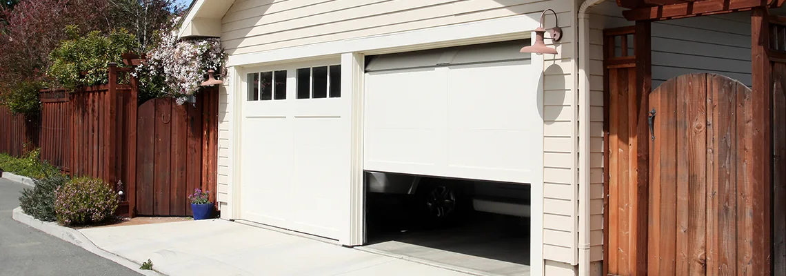 Fix Metal Garage Door Jerking in Port Charlotte, Florida